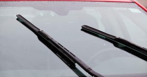 Windshield wipers on a red vehicle