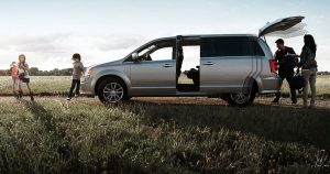 The 2019 Dodge Grand Caravan with a family