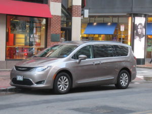 chrysler pacifica on street in silver