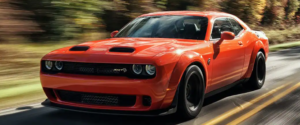 2022 Dodge Challenger in orange | Huffines CJDR Plano 